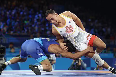 Darian Toi Cruz and Aman Sehrawat in action during their Men Freestyle 57kg Bronze Medal match